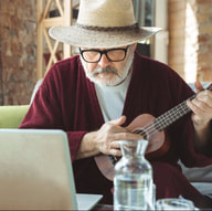 Image of older person taking virtual ukulele lesson